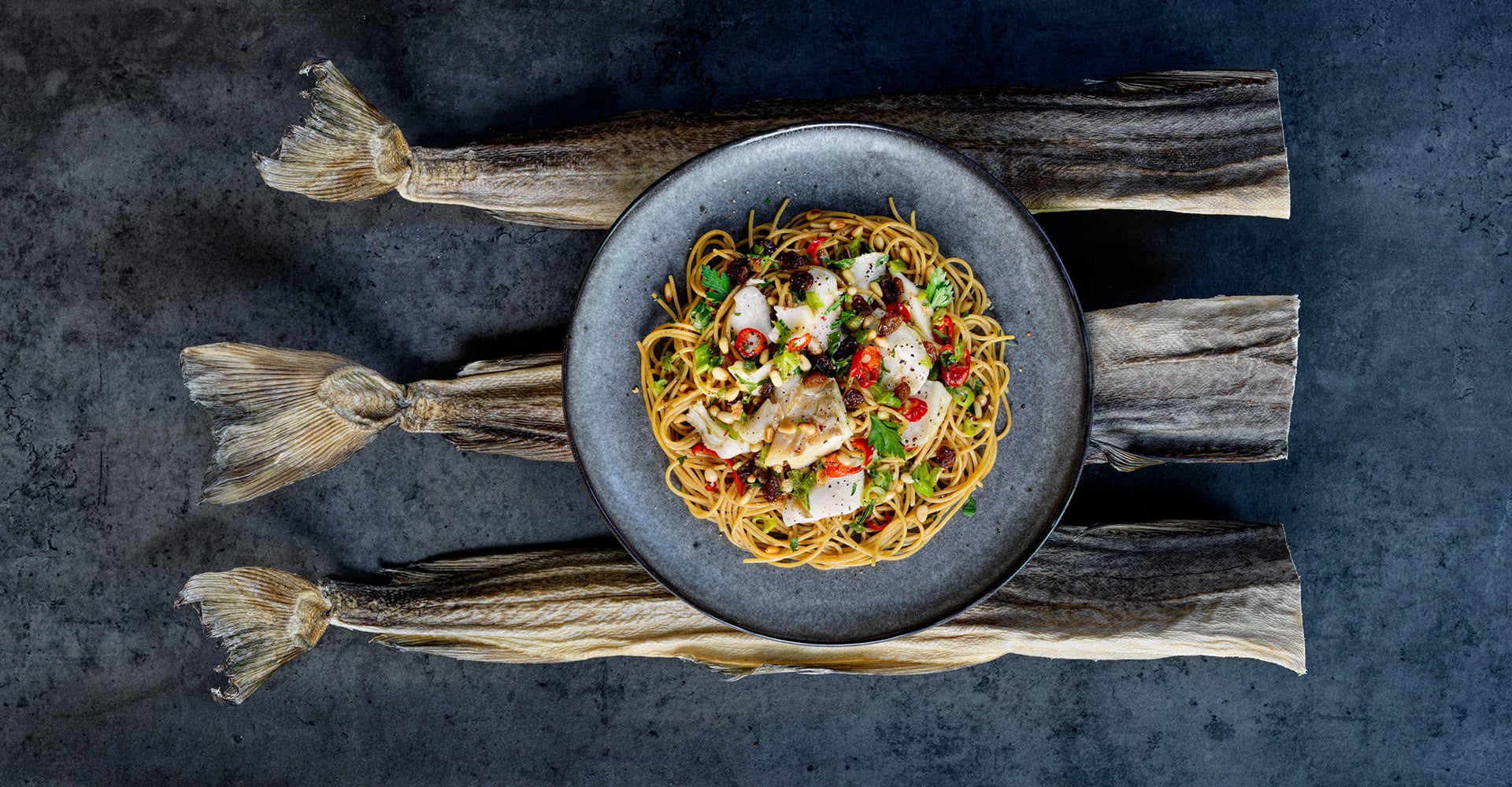 Spaghetti alla chitarra with Norwegian Stockfish, chili, raisins and pine nuts