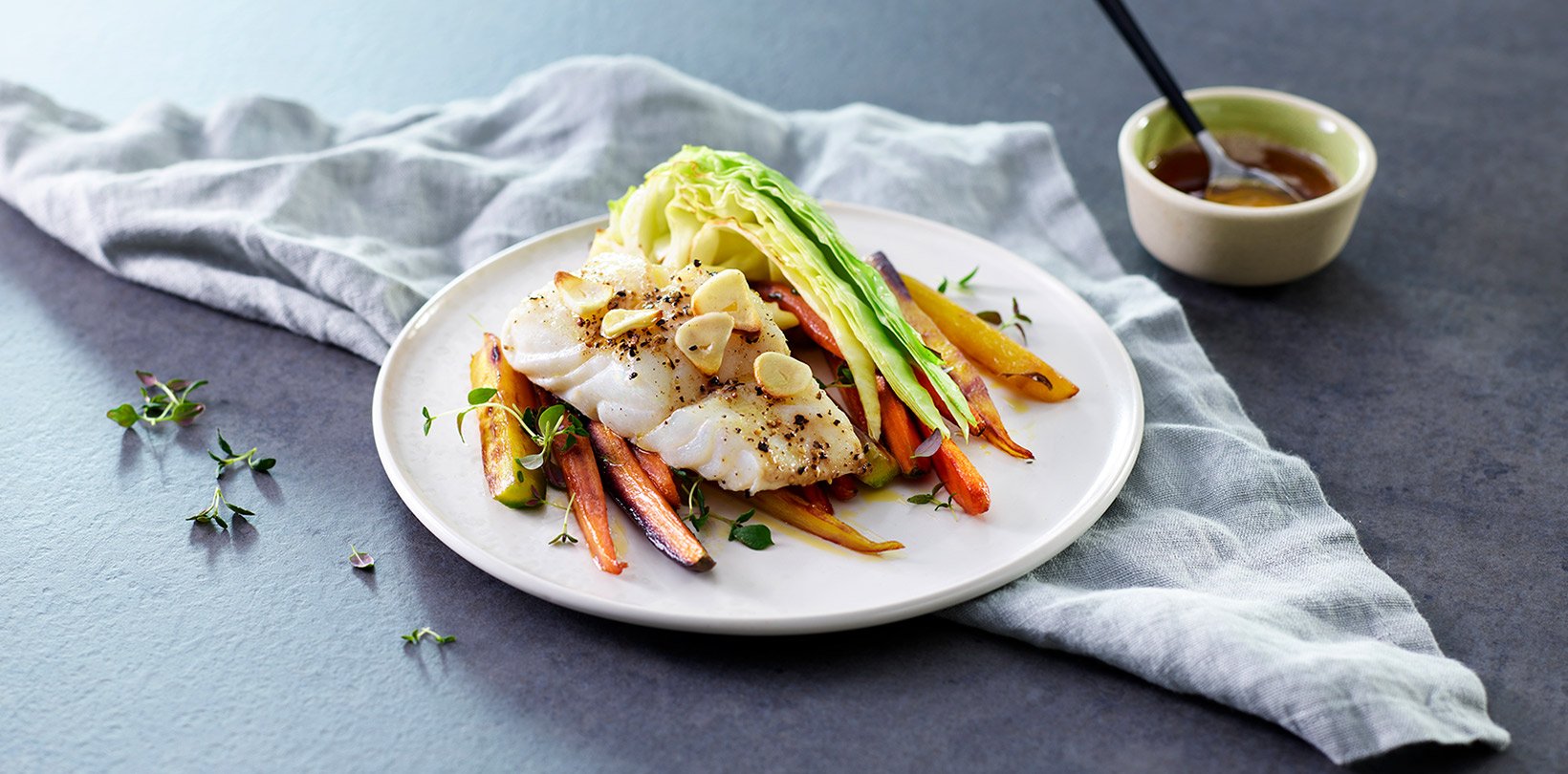 Oven-baked skrei with butter sauce and oxheart cabbage