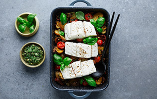 Baked Norwegian saithe in salsa verde