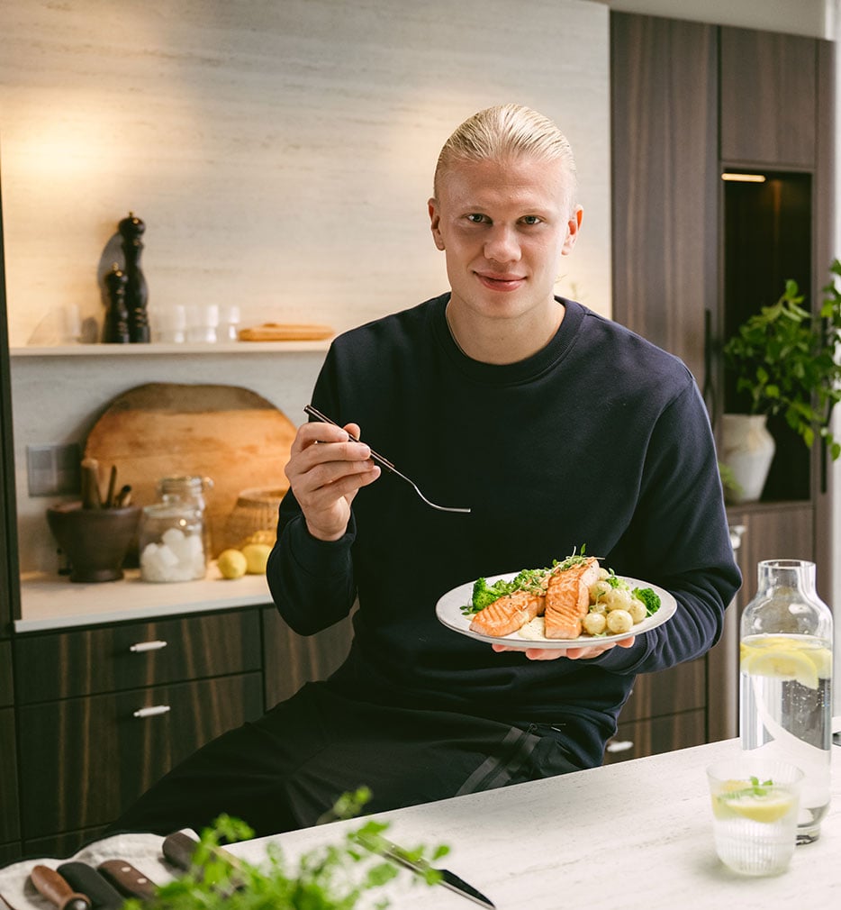 Haaland eating salmon